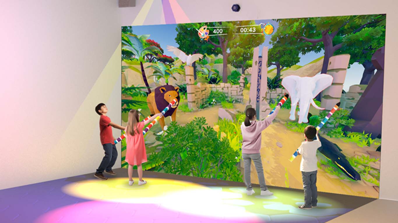Groupe d'enfants jouant a la solution Neo One Paint - Mur interactif - Neo Xperiences
