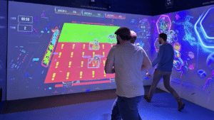 Players interacting with an interactive wall via their movements in a game based on NeoXperiences' Neo-Move technology